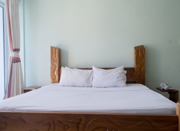 bedroom at Cowrie Shell Beach Apartments